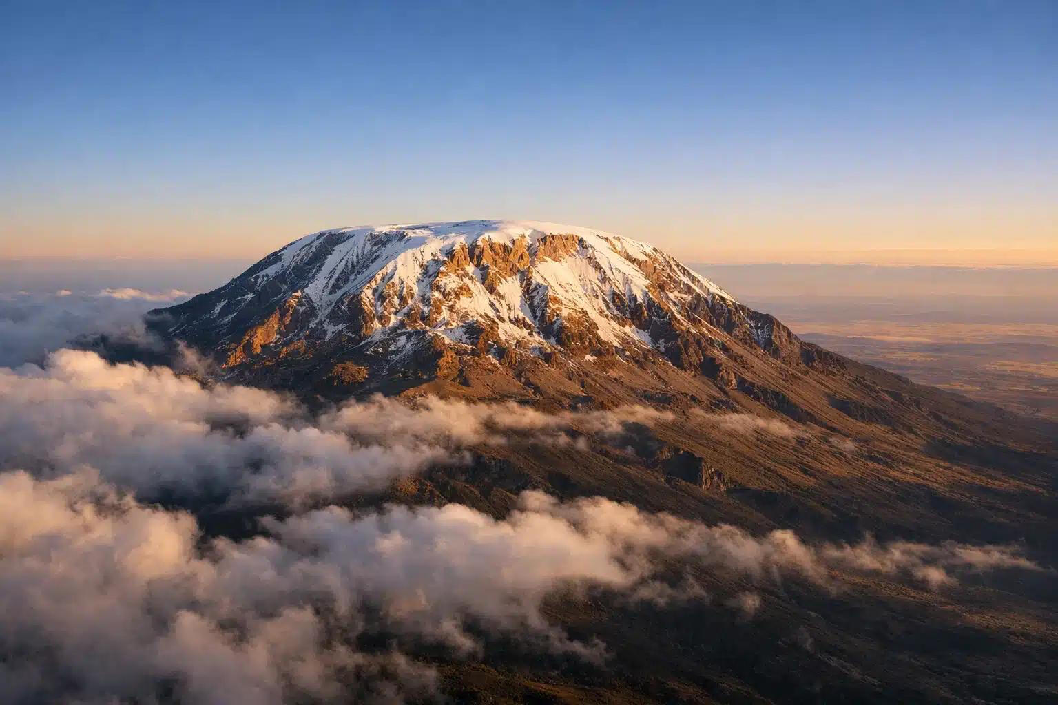 Mount Kilimanjaro Hiking Packages in Tanzania Snow-capped Mount Kilimanjaro in Tanzania, the destination for guided hiking and trekking packages